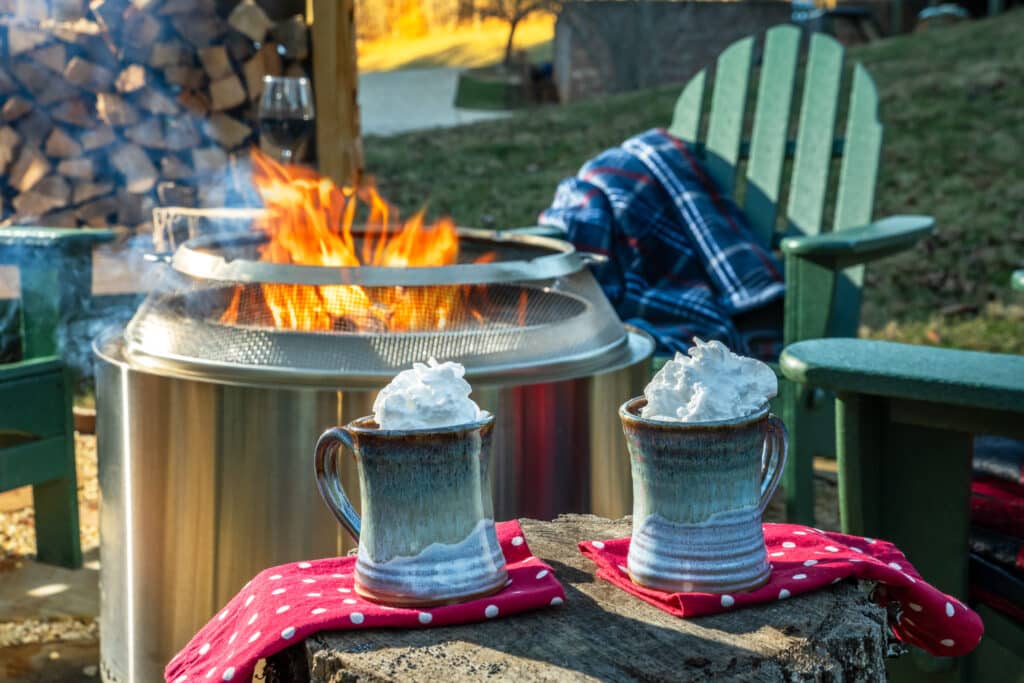 Hot cocoa by the fire pit on a cool evening at Inn at Amaris Farms near Asheville